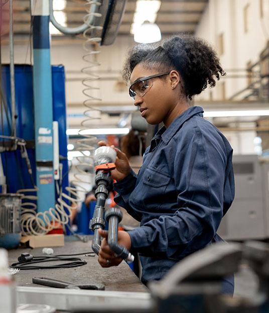 Woman working in manufacturing